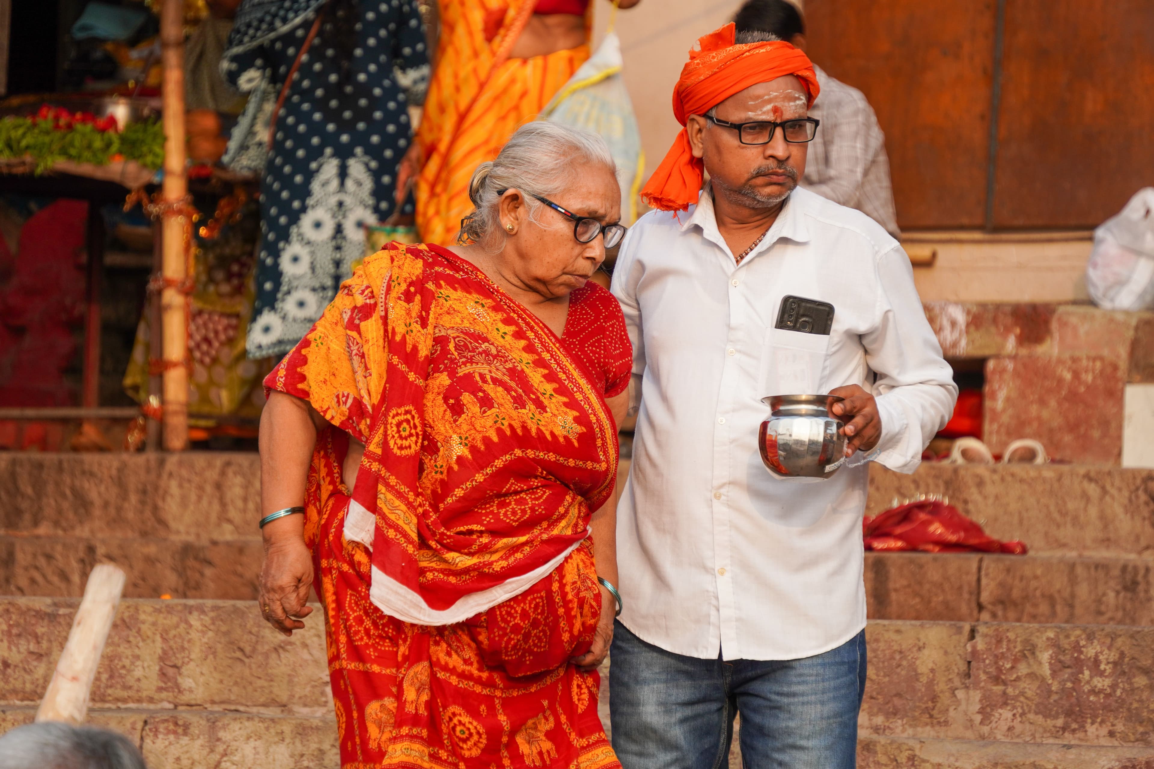 An elderly Indian woman on a festive visit to the ghats of Varanasi